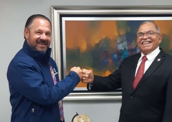 El Director Ejecutivo del Instituto Dominicano del Café INDOCAFE visita al despacho del Gerente General de la ARS del Banco del Reservas
